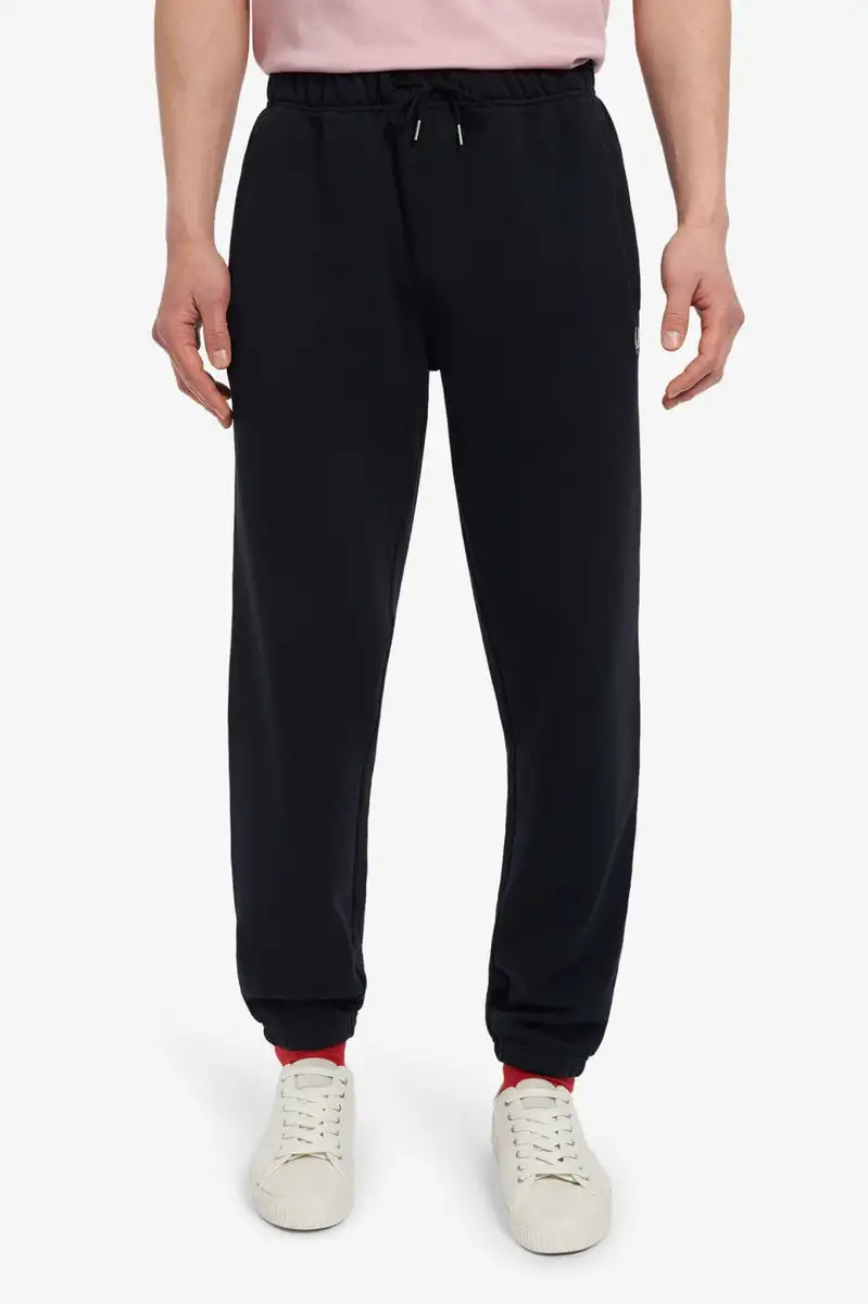 Pantaloni Uomo in tuta con tasche a filetto